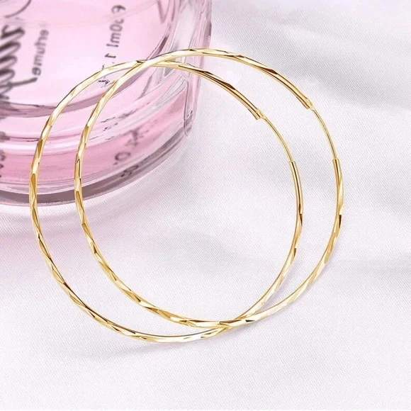 14K Yellow Gold Endless Twist Hoop Earrings, 50mm - Picture 5 of 6